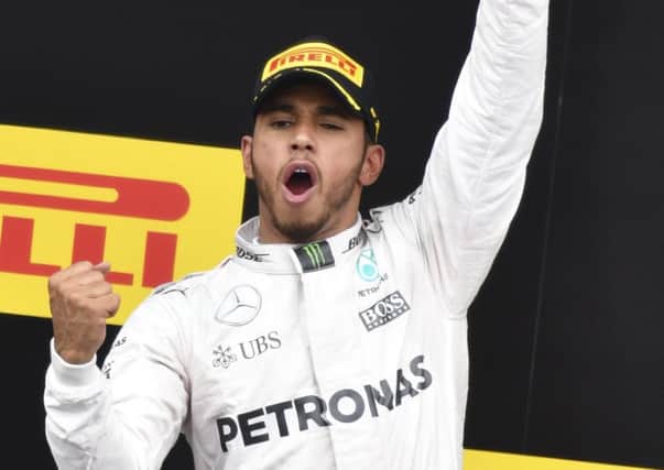 Lewis Hamilton was booed when he climbed on the podium to celebrate winning the Austrian GP. Picture: AP