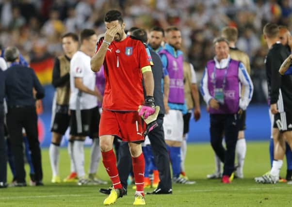 Italy goalkeeper Gianluigi Buffon leaves the pitch in tears. Picture: AP