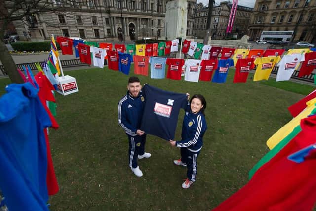 Scotland stars Robert Snodgrass and Gemma Fay help launch the Homeless World Cup, which takes place in Glasgow's George Square from July 10. Picture: John Devlin/TSPL