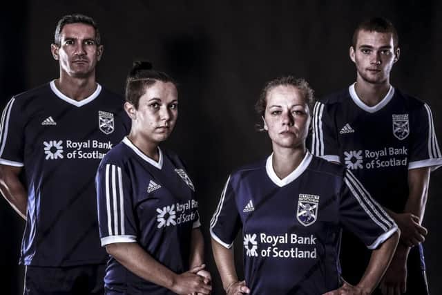 Four of the players who will represent Scotland at the Homeless World Cup show of the team's strip. From left, Craig McManus (40), Karen Boggie (34), Connor Henderson (21),  and Stephanie Tweed (21). Picture: Contributed