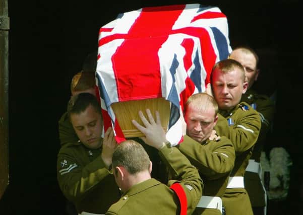 Soldiers of The Royal Highland Fusiliers carry the coffin of  Fusilier Gordon Gentle, 19, during his funeral at St James' Parish Church on July 7, in Pollok, Glasgow. Picture: Getty Images