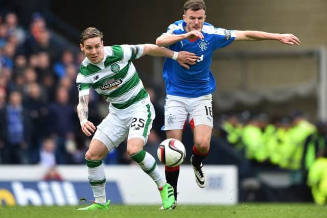 Stefan Johansen vies for the ball with Rangers midfielder Andy Halliday. Picture: Getty Images