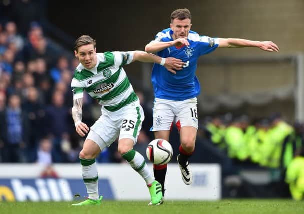Stefan Johansen vies for the ball with Rangers midfielder Andy Halliday. Picture: Getty Images