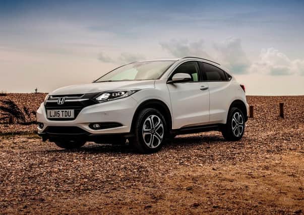 The HR-V bears a close resemblance to its larger cousin, the CR-V