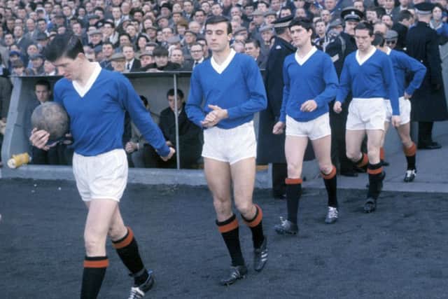 John Greig  with, from left, Ron McKinnon, Jim Baxter, Ralph Brand and Willie Henderson  during the 1960-61 season. Picture: SNS