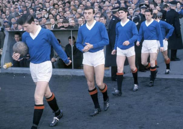 John Greig  with, from left, Ron McKinnon, Jim Baxter, Ralph Brand and Willie Henderson  during the 1960-61 season. Picture: SNS