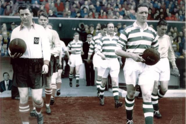 Jock Stein leads out Celtic alongside Clyde captain Tommy Anderson in 1955. Picture: SNS