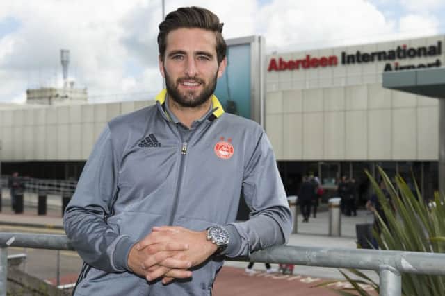 Graeme Shinnie at Aberdeen airport before the Dons left for Luxembourg. Picture: Ross Parker/SNS