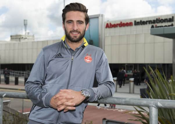 Graeme Shinnie at Aberdeen airport before the Dons left for Luxembourg. Picture: Ross Parker/SNS