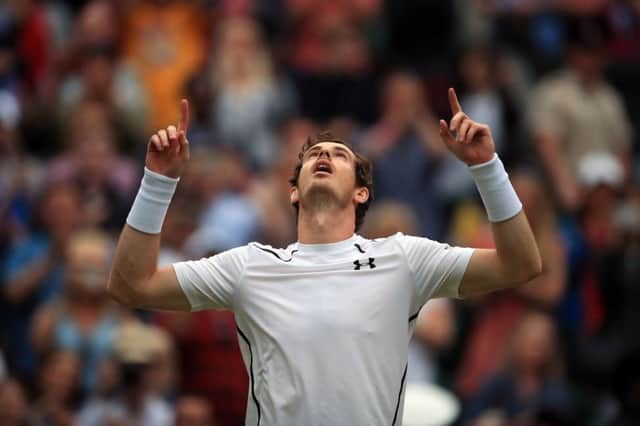 Andy Murray celebrates victory over Jo-Wilfried Tsonga on day nine of the Wimbledon Championships. Picture: PA