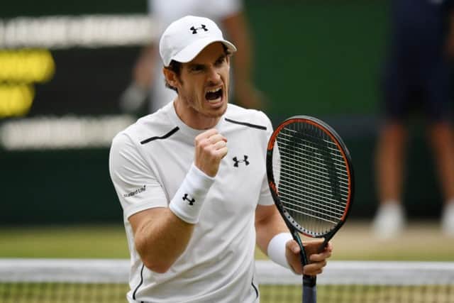 Andy Murray celebrates his victory at Wimbledon yesterday. Picture: Shaun Botterill/Getty Images