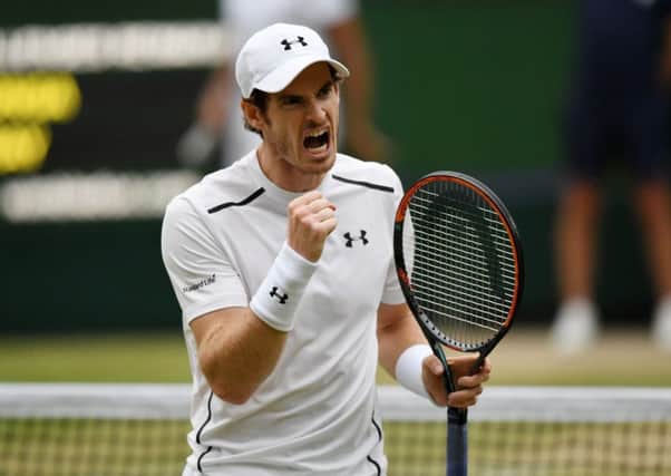 Andy Murray celebrates his victory at Wimbledon yesterday. Picture: Shaun Botterill/Getty Images