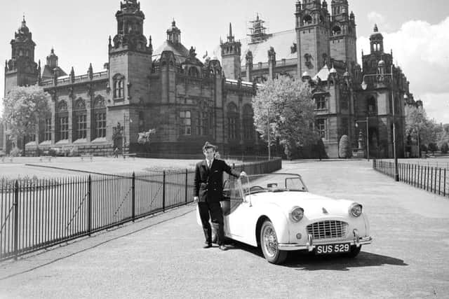 Ninian Sanderson, a well-known Scottish racing driver, poses with a Triumph TR3 outside Kelvingrove Museum in 1958. Picture: TSPL