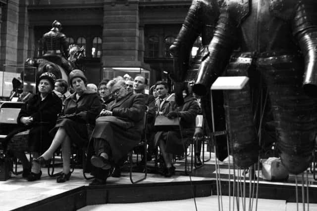 The excitement of the arms and armour exhibition at Kelvingrove in 1963 proves too much for one man. Picture: TSPL