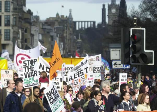 Anti-war protestors make their way along Princes Street on March 29, 2003. A US-led coalition including UK forces had invaded Iraq nine days previously. Picture: Andrew Stuart