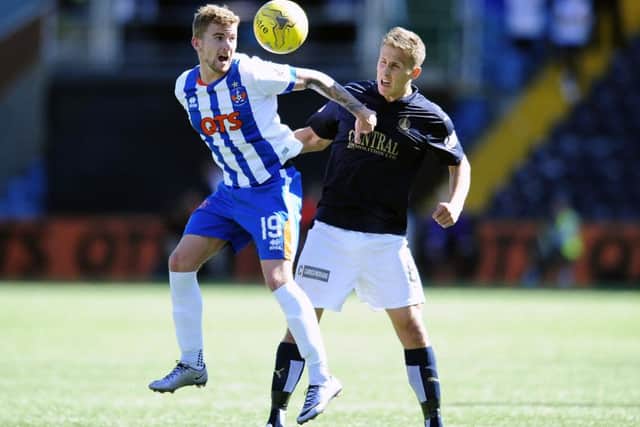 Craig Slater, left, has quit Kilmarnock for Colchester. Picture: Michael Gillen