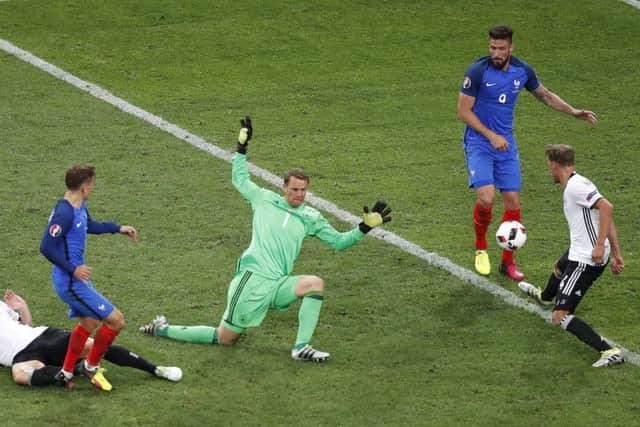 France's Antoine Griezmann, second left, scores his side's second goal during the Euro 2016 semi-final against Germany. Picture: Michael Sohn/AP