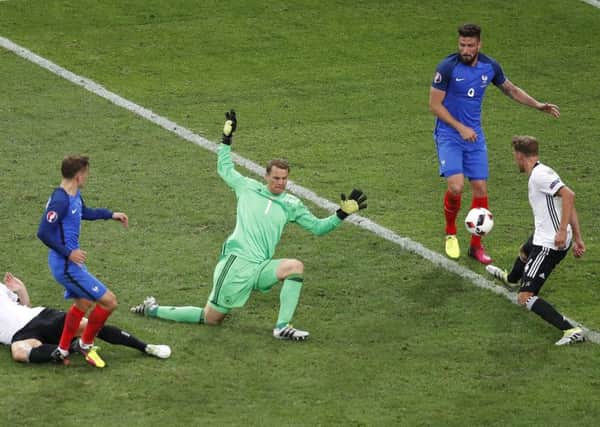 France's Antoine Griezmann, second left, scores his side's second goal during the Euro 2016 semi-final against Germany. Picture: Michael Sohn/AP