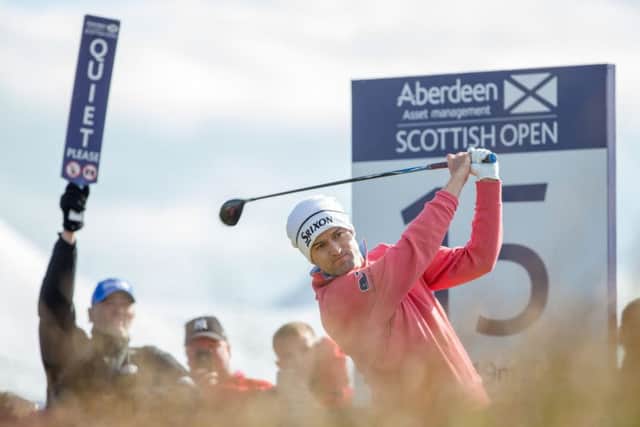 Russell Knox tees off at the 15th on his way to a round of 70 in the first round of the AAM Scottish Open. Picture: Kenny Smith/PA Wire