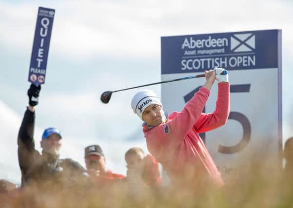Russell Knox tees off at the 15th on his way to a round of 70 in the first round of the AAM Scottish Open. Picture: Kenny Smith/PA Wire