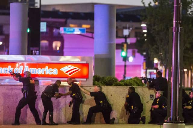 Dallas Police respond after shots were fired at a Black Lives Matter rally in downtown Dallas. Picture: Smiley N. Pool/The Dallas Morning News