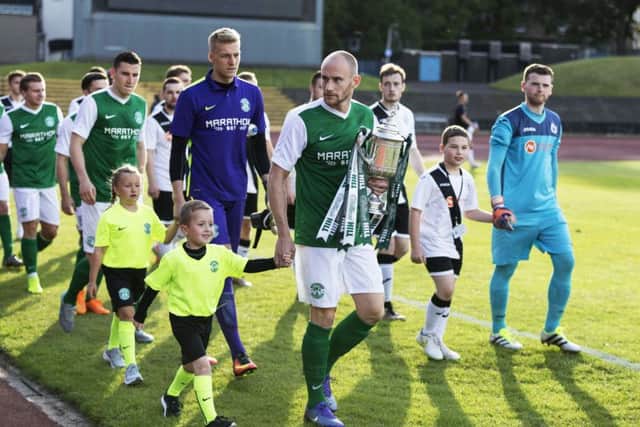 Hibs fans have rushed to snap up season tickets following the club's Scottish Cup final triumph. Picture: Alan Rennie/SNS