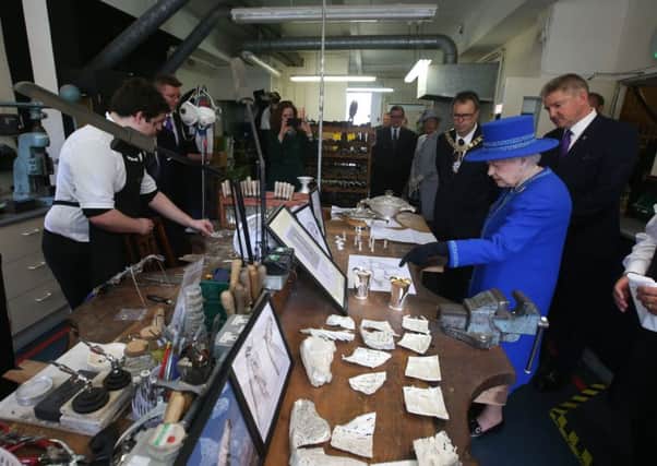 The Queen in the silversmiths workshop during a visit to Hamilton and Inches jewellers. Picture: Andrew Milligan/PA Wire