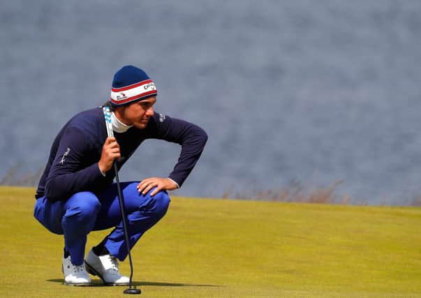 Matteo Manassero of Italy lines up a putt on the 18th green. Picture: Getty.