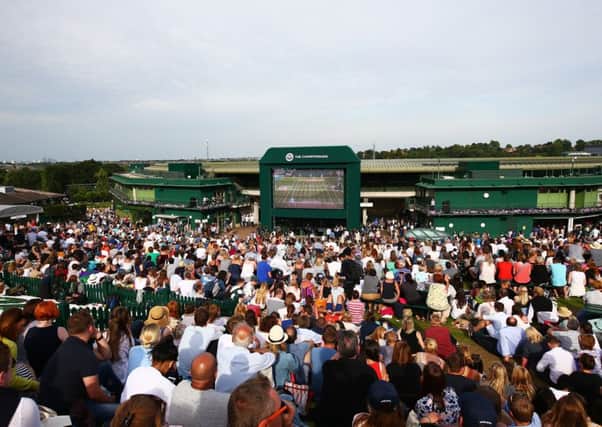 Fans cheer on Andy Murray from Henman Hill/Murray Mound. Picture: Getty