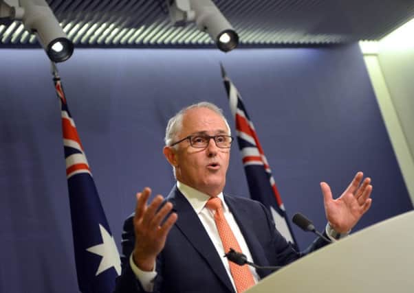 Australia's Prime Minister Malcolm Turnbull declares victory for the ruling conservatives.
Photo: PETER PARKS