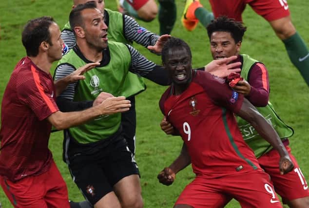 Eder celebrates after scoring the winning goal in extra-time. Picture: PA