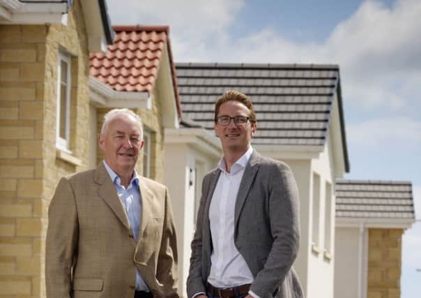 Campion Homes boss Pete Bell, left, with BGF's Patrick Graham. Picture: Contributed