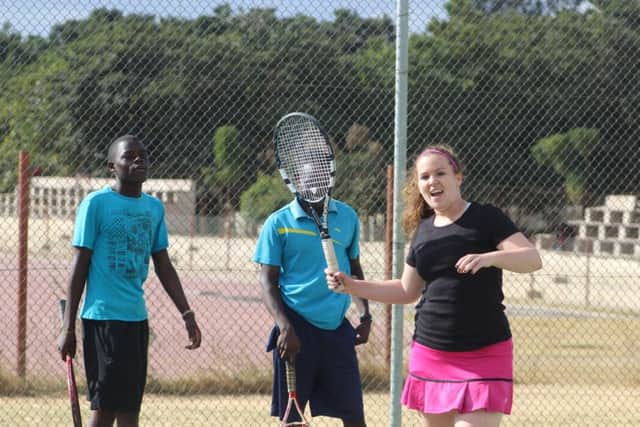 Regi Monroe training young players in Zambia. PIC Contributed.