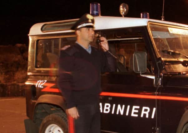 Italian Police and Carabinieri paramilitary police are attending the scene of a train crash near the town of Andria in the Puglia region. Picture: AP Photo