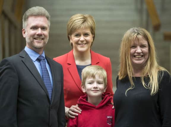 Gregg and Kathryn Brain, with their son Lachlan, seven, met First Minister Nicola Sturgeon. Picture: PA