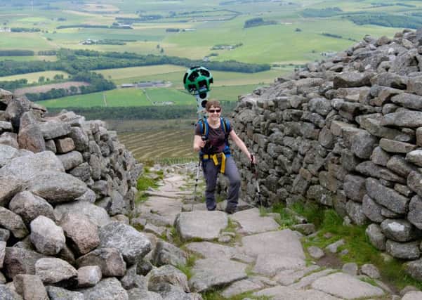 Helen Webster passing through Bennachie with Google equipment. Picture: Contributed