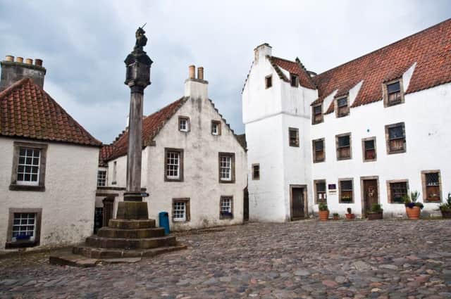 The 17th century buildings around the Mercat Cross in Culross, Fife, highlight the village's former life as an important trading port with the Low Countries. Pantile roofs and crow-stepped gables are Flemish in origin. Picture: Contributed