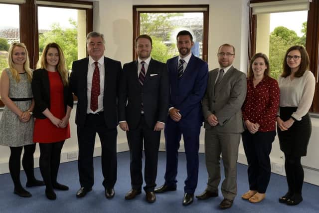 Mark Hendrie, fourth left, flanked by Paul Clancy senior and junior and the Clancy Hendrie team. Picture: contributed