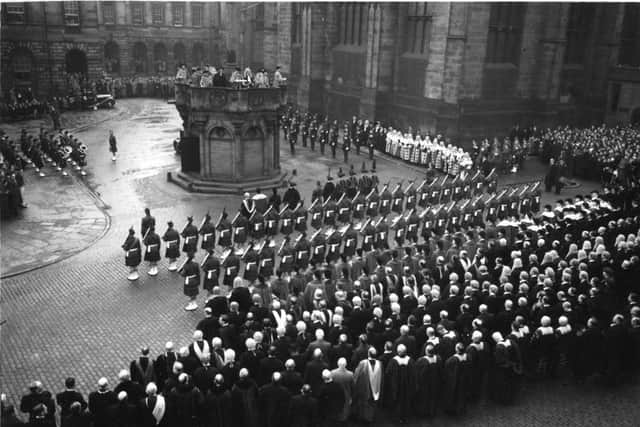 The proclamation of Queen Elizabeth II
 is read by the Lord Lyon at Edinburgh's mercat cross on February 8, 1952. Picture: TSPL