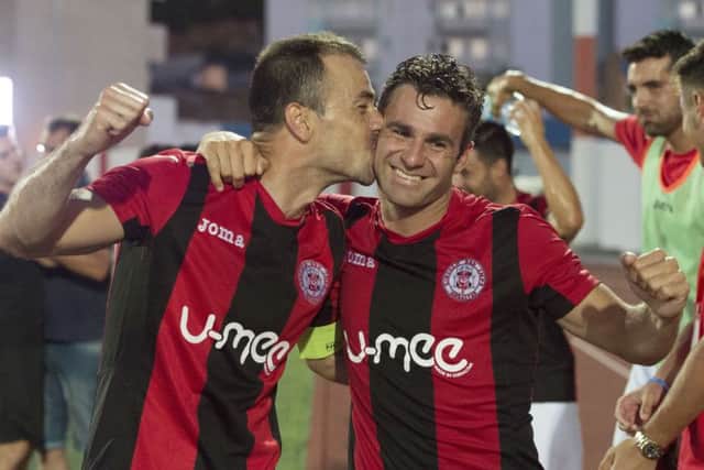 Lincoln Red Imps' Lee Casciaro (right) and Roy Chipolina celebrate their shock win at full time. Picture: SNS