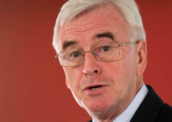 MP John McDonnell was cheered after turning air blue. Picture: PA