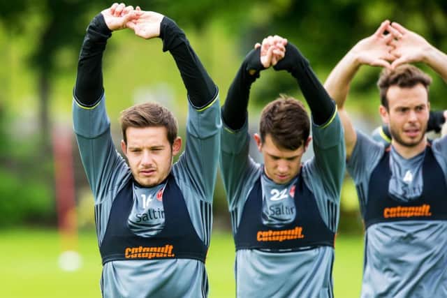 Peter Pawlett, left, leads his team-mates in training ahead of Aberdeen's Europa League clash with Ventspils. Picture: SNS