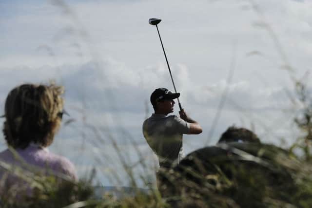 Jason Day plays his shot from the 13th tee during practice yesterday. Picture: Ben Curtis/AP