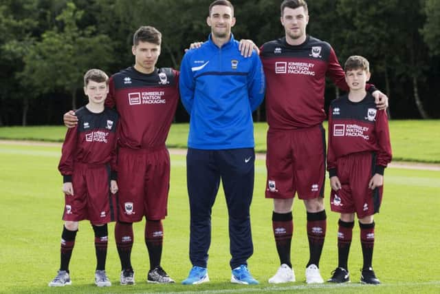 Rangers captain Lee Wallace with players from Tynecastle FC where he is first team coach. Picture: SNS