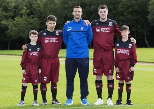 Rangers captain Lee Wallace with players from Tynecastle FC where he is first team coach. Picture: SNS