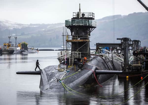 Mrs May has the future of the UKs nuclear defences to sort out as MPs vote on the renewal of Trident on Monday. Picture: PA