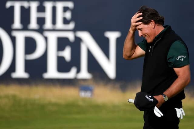 Phil Mickelson reacts on the 18th green after his birdie attempt for a record round of 62 lipped out. Picture: Jan Kruger/R&A/R&A via Getty Images