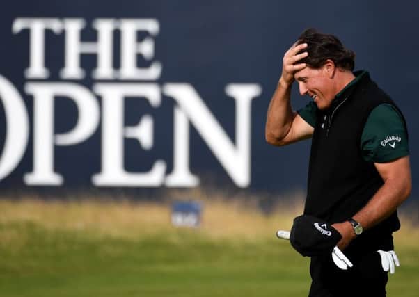 Phil Mickelson reacts on the 18th green after his birdie attempt for a record round of 62 lipped out. Picture: Jan Kruger/R&A/R&A via Getty Images
