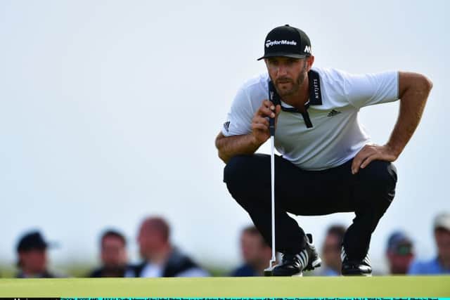 Dustin Johnson lines up a putt at Troon yesterday. The world No 2 signed for a level-par 71. Picture: Stuart Franklin/Getty