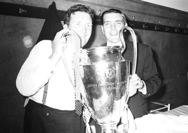 Jock Stein, left, with Bobby Murdoch and the European Cup. Picture: AP